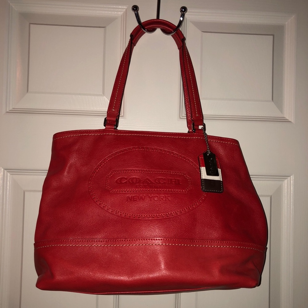 Red leather Coach with red, white & blue tag